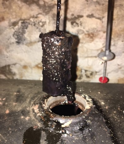 heating oil float gauge with sludge buildup
