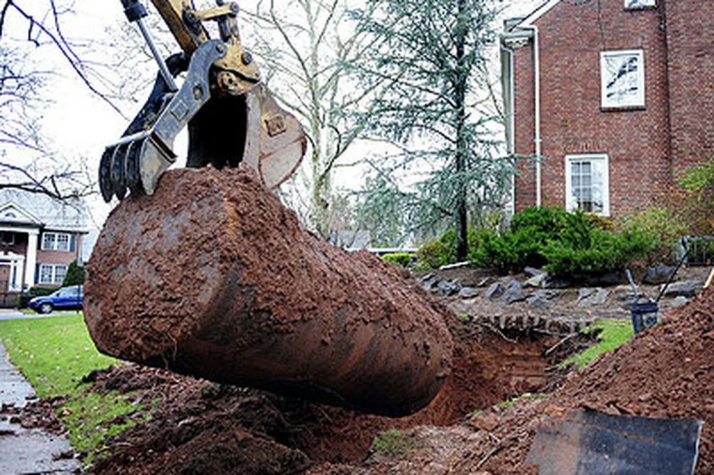 underground heating oil tank being removed